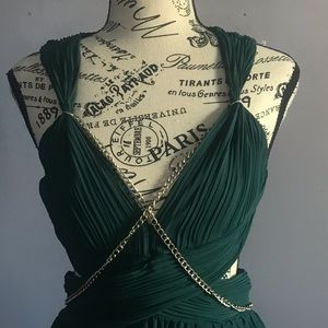 Floor length deep green goddess themed dress